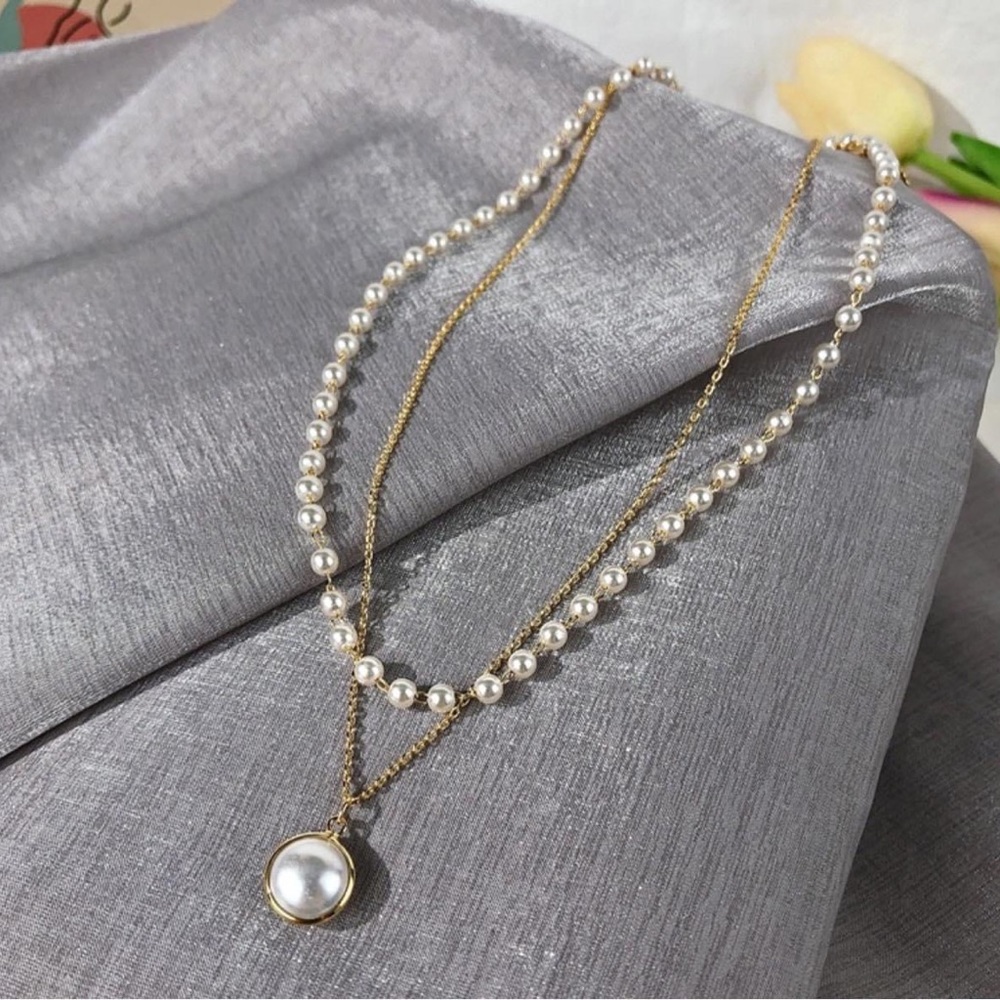 Double pearl gold necklace